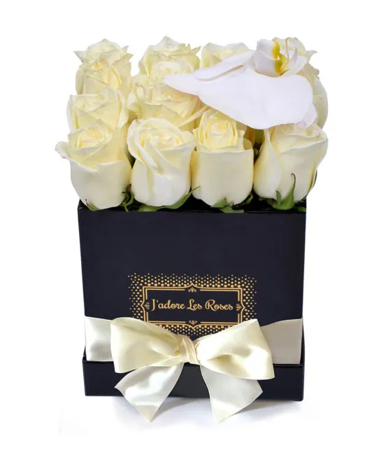 white roses with orchid in black small square box