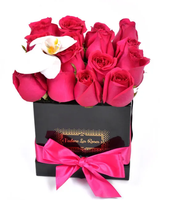 fuchsia roses with orchid in small box
