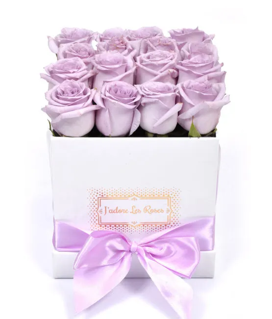 purple roses in white small square box