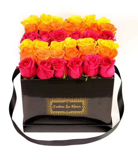 orange yellow fuchsia roses in medium box