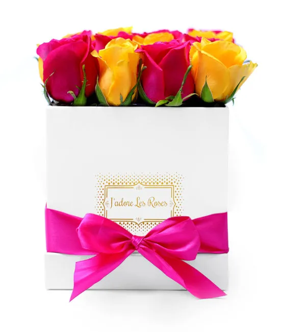 yellow fuchsia roses in white square box