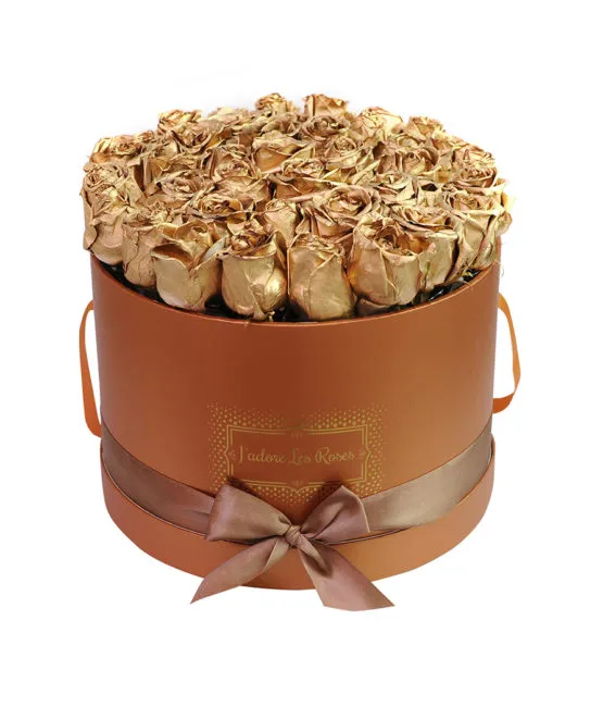 gold roses in bronze round box